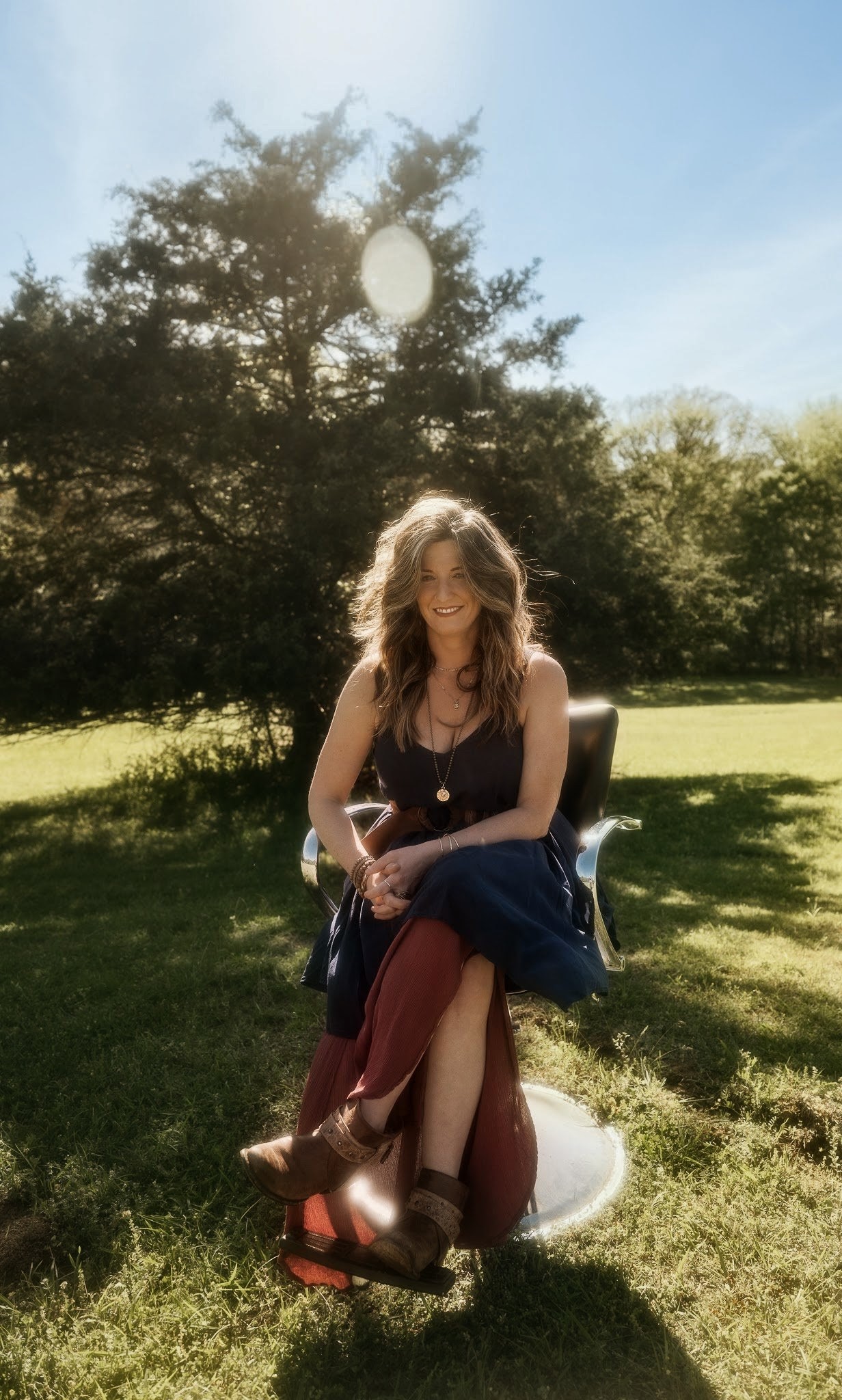 ChristyLee seated in her styling chair